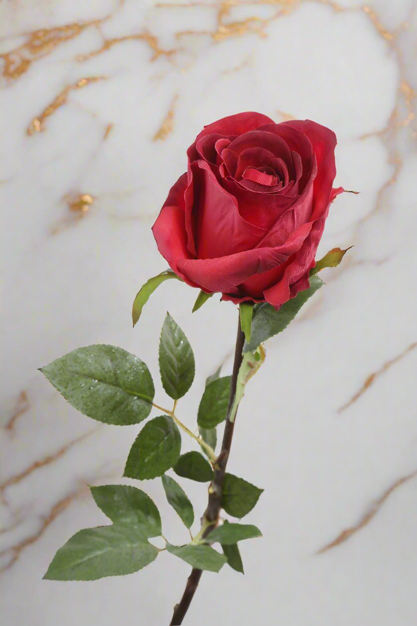 Pretty large red silk rose bud